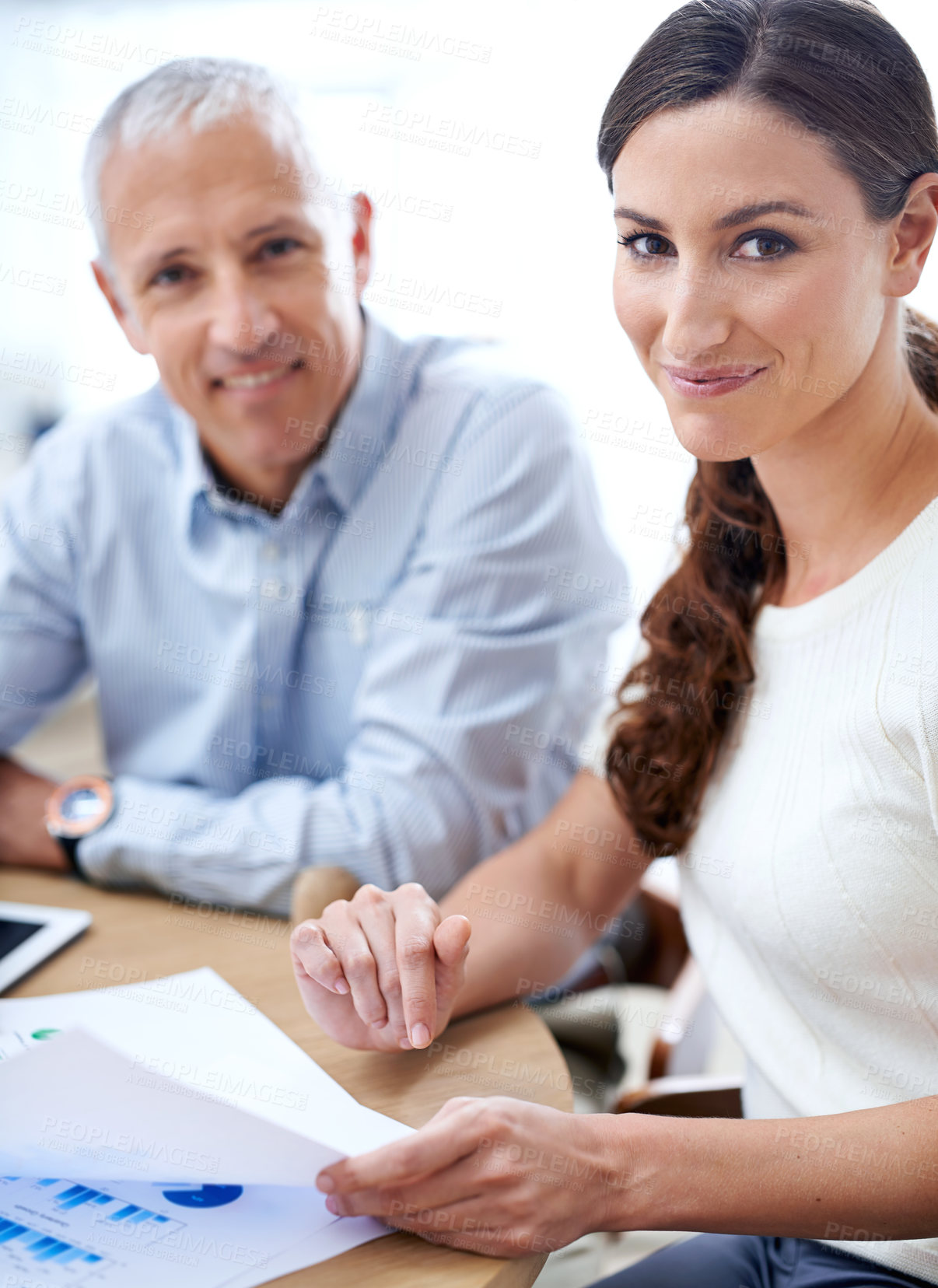 Buy stock photo Portrait, man and woman in office with documents for sales review, growth or development online. Planning, strategy and business people at desk with stats for data analysis, feedback or profit report