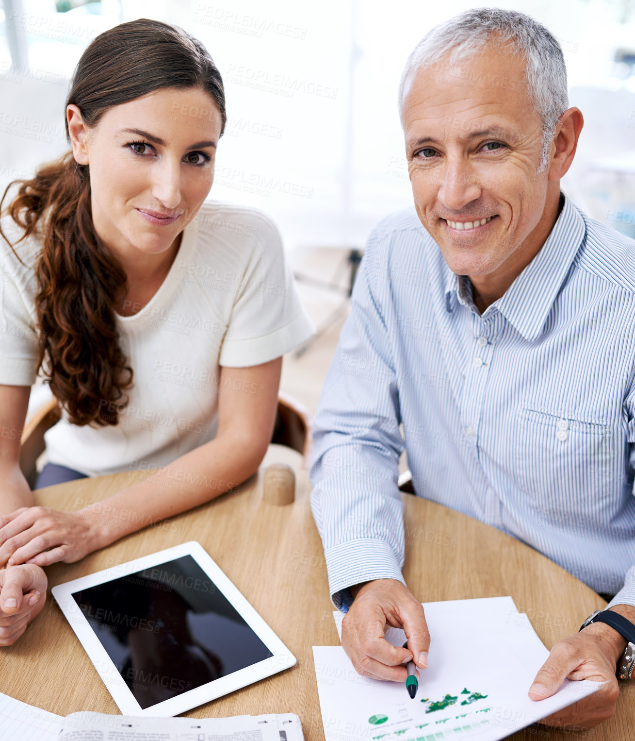 Buy stock photo Portrait, businessman and woman with stats, tablet and sales review on growth, development or market trend. Planning, strategy and business people at desk for data analysis, feedback or profit report