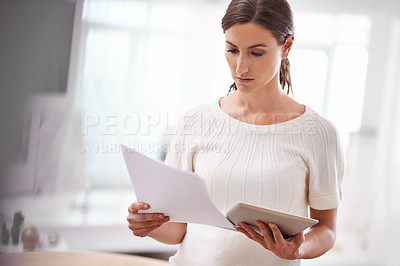 Buy stock photo Businesswoman reading, paperwork and tablet in office or technology, online documents with serious person. Entrepreneur, creative business planning and internet, social media website and browsing
