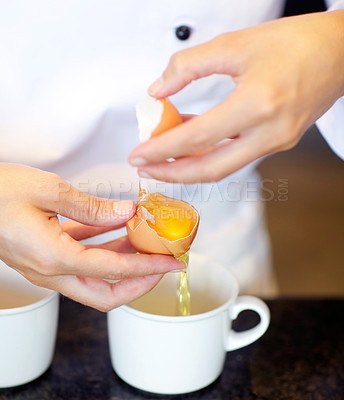 Buy stock photo Baker, hands and separate eggs for yolk, white and preparation for cooking, dessert or meal in kitchen job. Professional pastry chef, start work or ready ingredients for process, cake or food at cafe