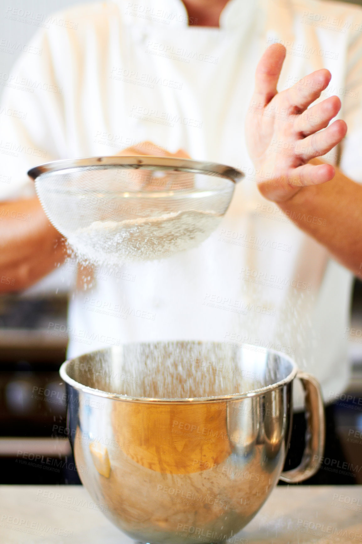 Buy stock photo Baker hands, sifting flour and baking skill, cake or pastry with metal bowl closeup, dessert and person in bakery kitchen. Cooking, chef and catering industry tools and production with confectionery