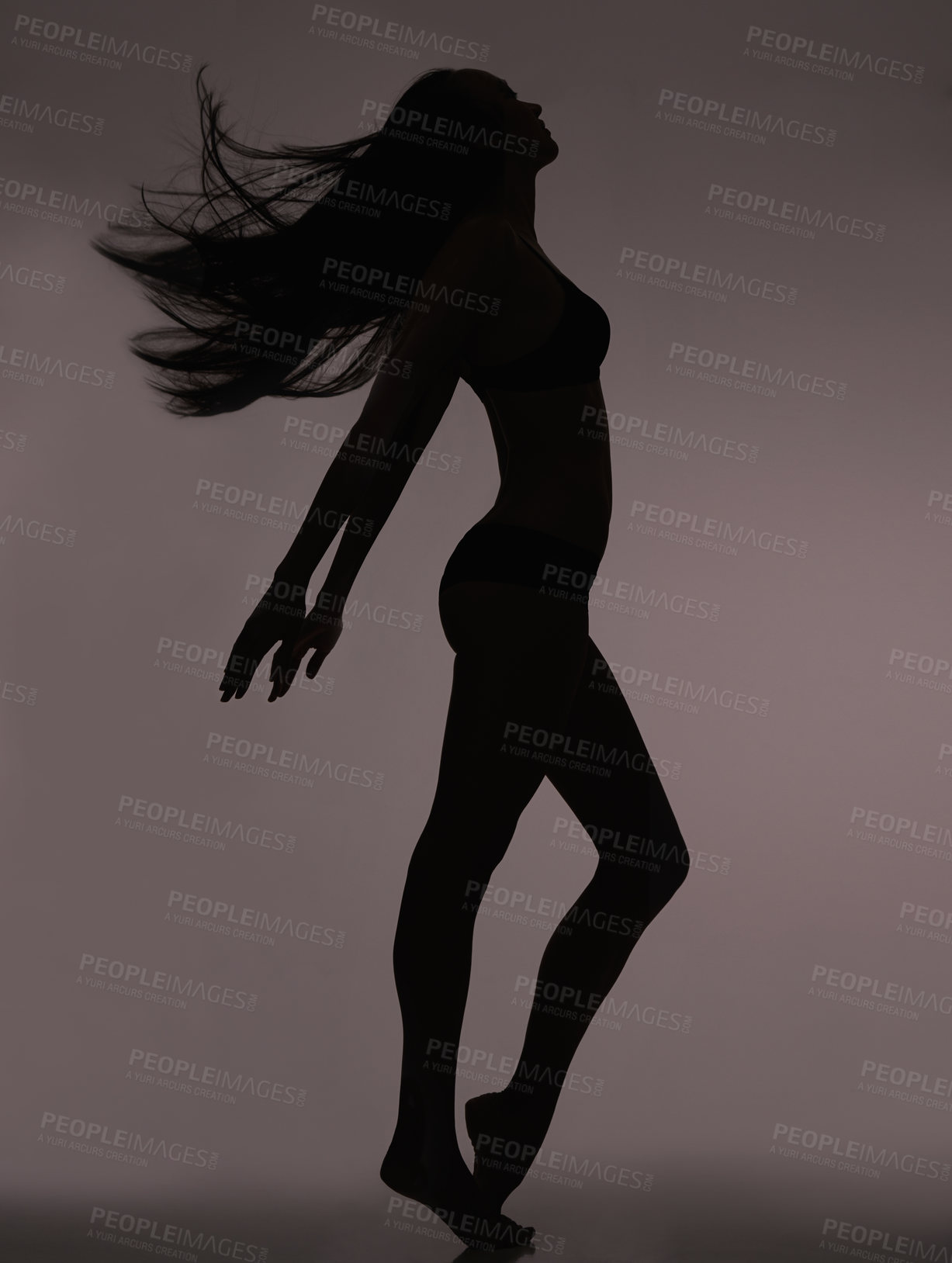 Buy stock photo Dancer, woman and silhouette with shadow figure, body care and sensual on a dark studio background. Person, profile and model with beauty and seductive with wellness and natural pose with slim girl