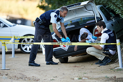 Buy stock photo Shot of a crime scene investigation in progress