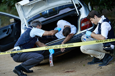 Buy stock photo Shot of a crime scene investigation in progress