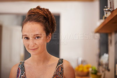 Buy stock photo Portrait of a young woman with dreadlocks standing in her home