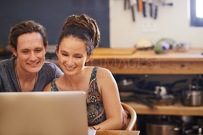 Buy stock photo Shot of an affectionate young rastafarian couple at home
