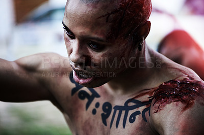 Buy stock photo A cropped shot of a man with a serious wound on his shoulder