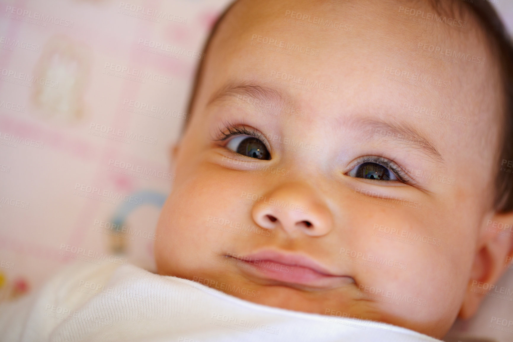 Buy stock photo Smile, portrait and a baby on a bed for playing, wake up and cozy in the morning. Happy, youth and face of a girl, infant kid or child in the bedroom of a house to relax with comfot in childhood