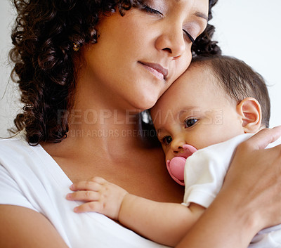 Buy stock photo Cuddling, hug and a mother and child sleeping with love, care and relax together in a house. Family, peace and a mom with a newborn, baby or infant kid with affection in motherhood for rest and calm