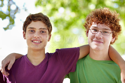 Buy stock photo Portrait of two teenage boys hanging out at the park