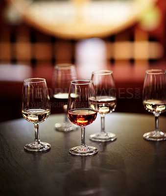 Buy stock photo Shot of wine glasses laid out for tasting at a wine cellar