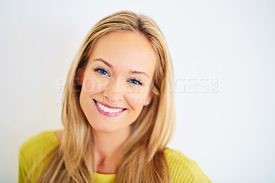 Buy stock photo Portrait, smile and woman in a house with confidence, positive attitude and feel good mood on white wall background. Face, happy and female person at home with optimism, relax and chilling on weekend