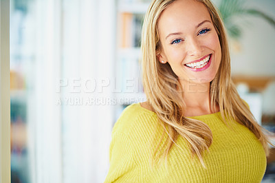 Buy stock photo Cropped shot of a happy young woman at home