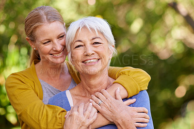 Buy stock photo Senior mother, woman and hug outdoor with happiness, love and care in portrait by trees on holiday. Elderly mama, lady and embrace with bond, excited face and support in backyard with summer sunshine