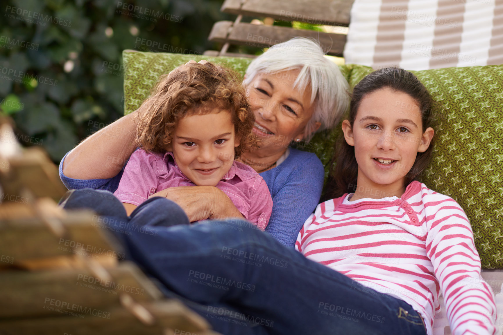 Buy stock photo Senior woman, grandchildren and hammock in garden with smile to relax for retirement, break and enjoy. Portrait, girls and happy in home in summer or hot weather for school holiday with grandma