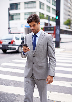 Buy stock photo Smartphone, business man and walking in city for communication, social media or typing text massage. Professional, mobile phone and male employee in suit for networking, reading email or commute