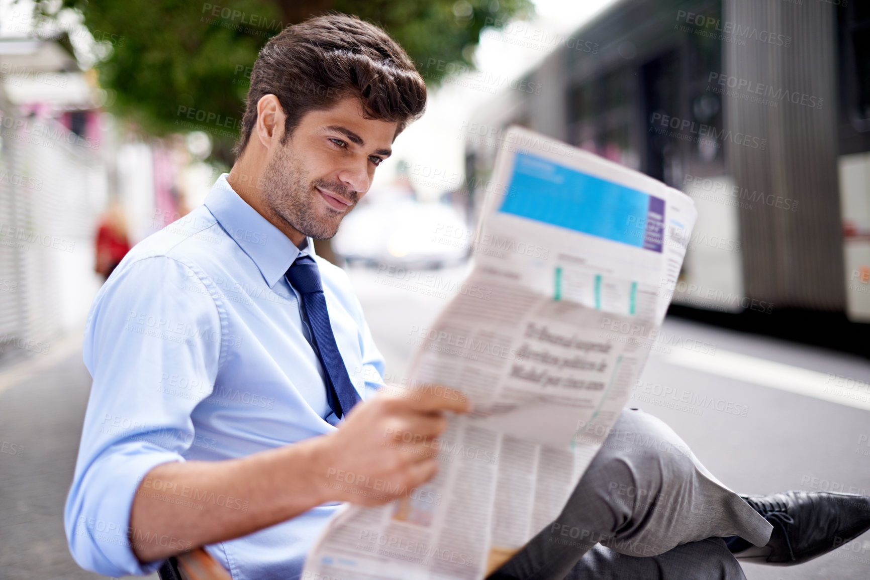 Buy stock photo Professional, businessman and reading newspaper for information, daily news and updates on local events. Outdoors, male person and smile with article for stories, journalism and newsletter in city