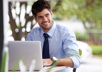 Buy stock photo Laptop, thinking and remote working businessman, smile and outside cafe for online work. Pensive, internet and technology for email for professional male person, notes and reports or paperwork