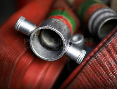 Buy stock photo Cropped shot of a group of fire hoses