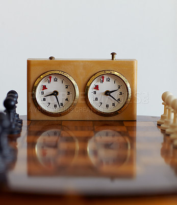 Buy stock photo Chess sport, timer and clock for challenge isolated on a white background mockup in studio. Game, board and countdown for time, alarm and tactical competition for strategy, logic and vintage watch.