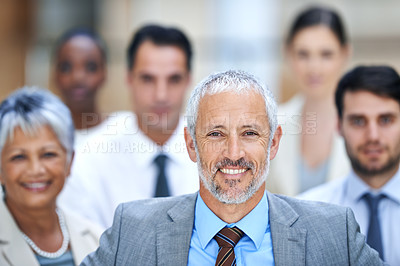 Buy stock photo Portrait, leadership and group of business people with mature manager, confidence or solidarity at startup. Community, professional men and women together in office with teamwork, pride and happy CEO