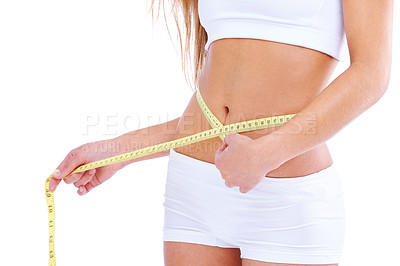 Buy stock photo Woman, studio and waistline for measuring, health and wellness with diet and weight loss. Person, abdomen and commitment for training, goals and fitness with exercise or workout for proud body care