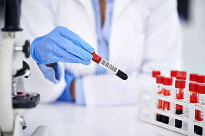 Buy stock photo Hand, blood and science with a doctor in a laboratory for dna research or innovation using a sample. Healthcare, medical and investigation with a scientist working in a lab for genetic analysis