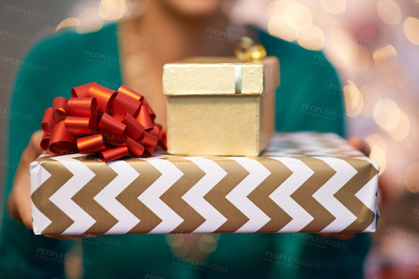 Buy stock photo Cropped shot of a person holding a Christmas gift