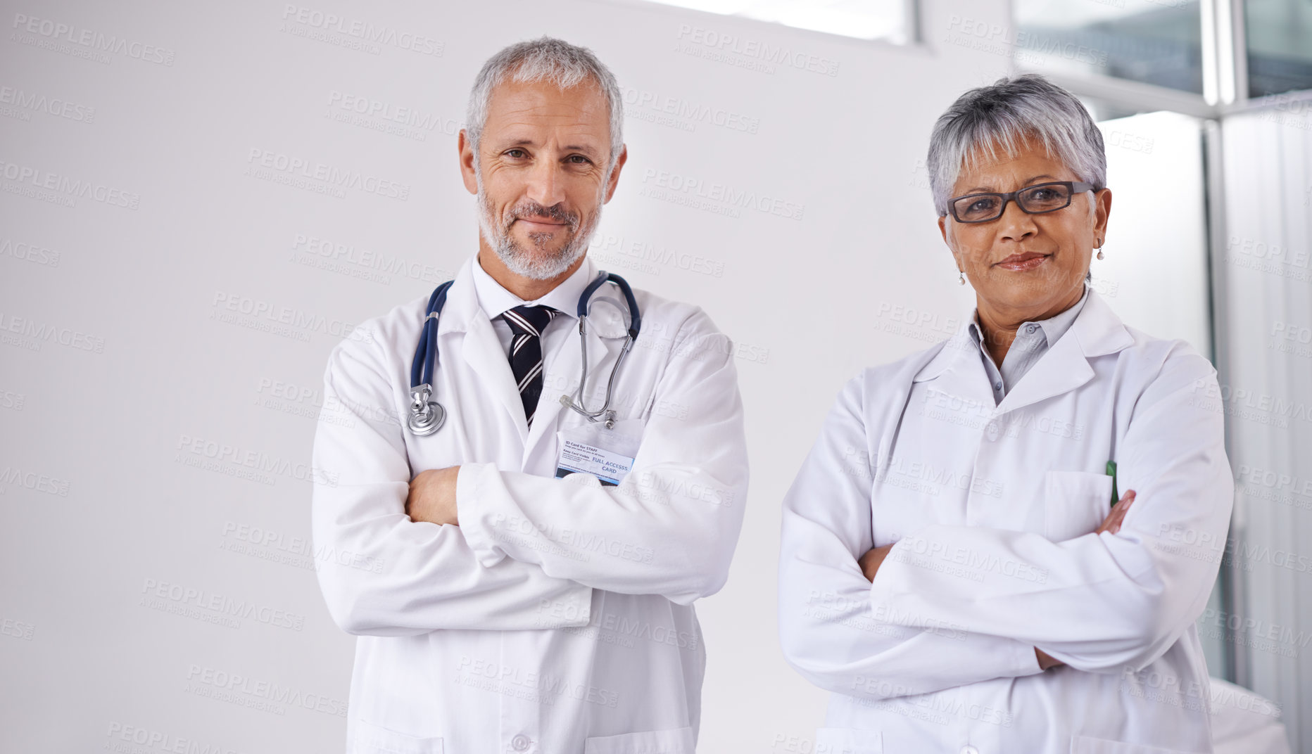 Buy stock photo Shot of two doctors working together in a hospital