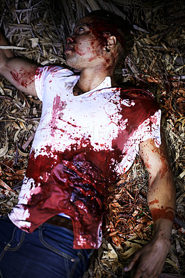 Buy stock photo A cropped shot of a murder victim found outdoors