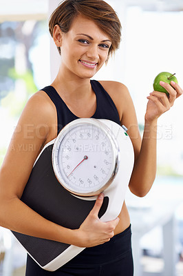 Buy stock photo Portrait, scale and happy woman with apple for fitness, nutrition or wellness with healthy body. Weight loss, smile and person with green fruit, vitamin c and eating organic food for diet outdoor