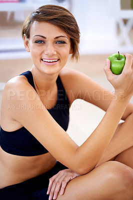 Buy stock photo Portrait, fitness and happy woman with apple in gym for diet, nutrition or wellness with healthy body. Face, smile and person with green fruit and eating organic food with vitamin c for benefits
