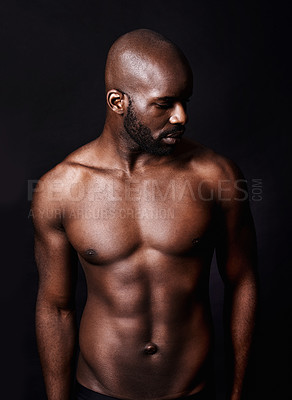 Buy stock photo Cropped shot of a shirtless muscular man isolated on black