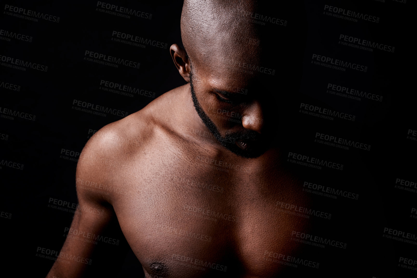 Buy stock photo Black man, muscle and fitness with shadow for workout or exercise on a dark studio background. Closeup of young African male person or bodybuilder with masculine or muscular body on mockup space