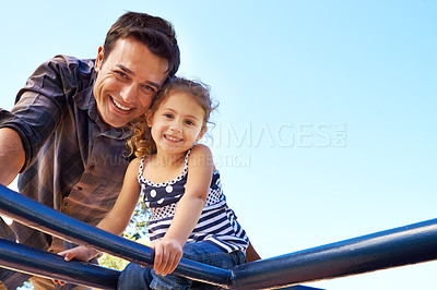 Buy stock photo Portrait of a father and daughter on the jungle gym