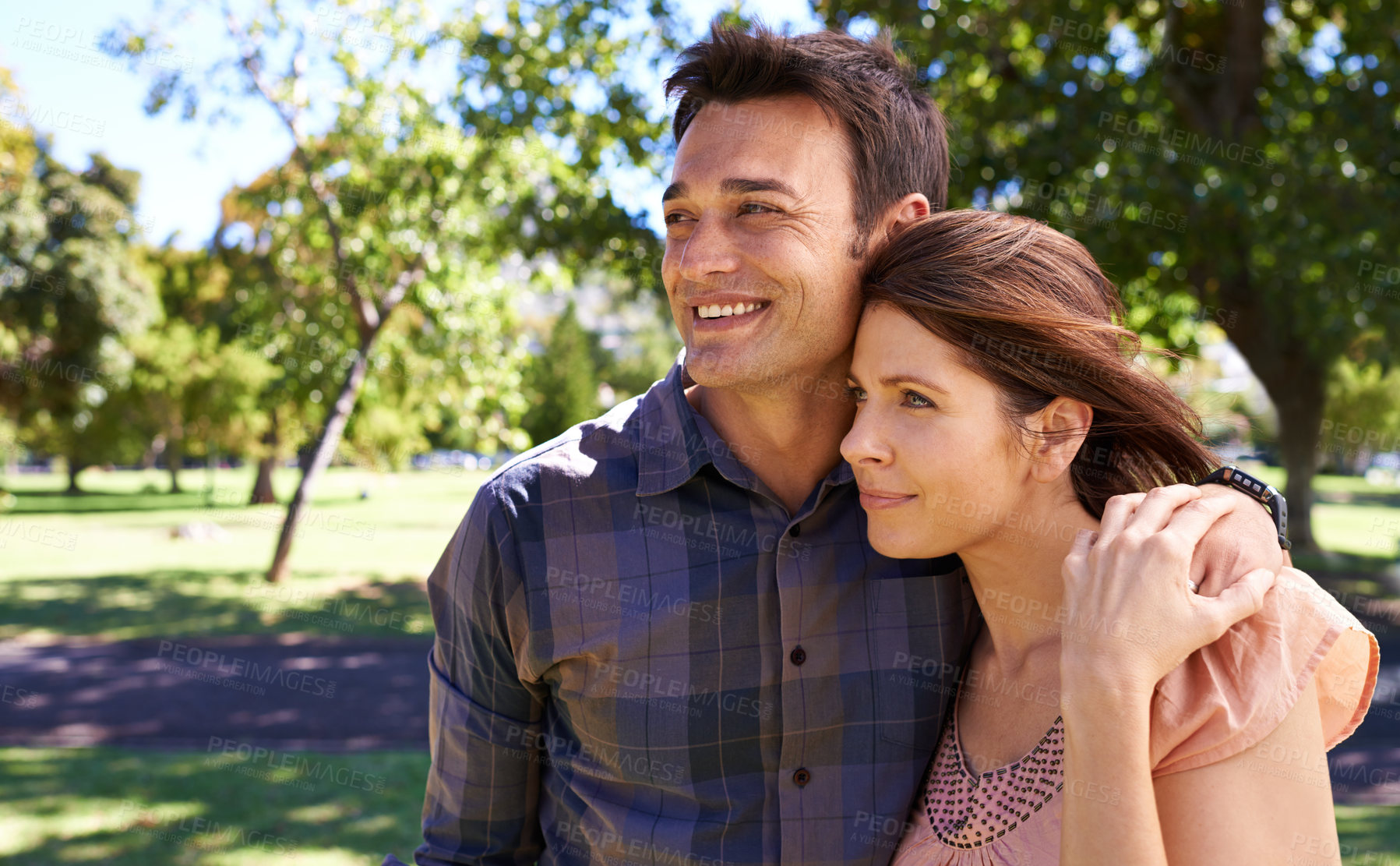 Buy stock photo Couple, hug and happiness at park with love for bonding, relax and summer date outdoor in Amsterdam. Man, woman and face with smile in nature with healthy relationship, anniversary trip and support