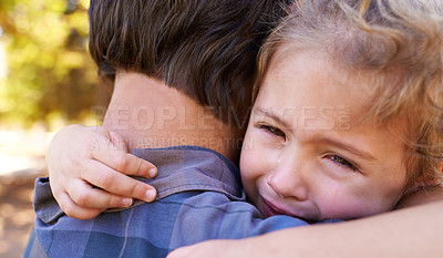 Buy stock photo Hug, sad girl and father in a park, emotions and expression with reaction and crying with single parent. Loss, family and outdoor with dad and daughter with embrace and grief with tears, adhd or pain