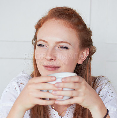 Buy stock photo Thinking, calm and woman with a cup of coffee in a studio for relax in the morning on a weekend. Dreaming, memory and face of a female model drinking cappuccino, caffeine or latte by white background