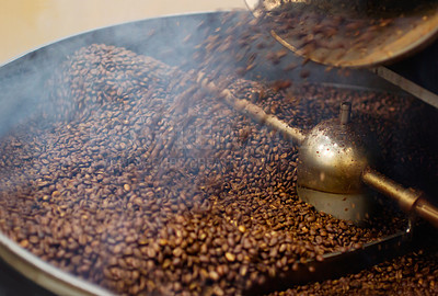 Buy stock photo Cafe, mix and coffee beans in a machine for a raw blend, textures and steam in a pot. Food, industry and espresso and caffeine product premium grain as an export or import for trade and drink