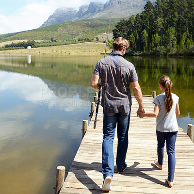 Buy stock photo Father, daughter and holding hands by lake for fishing, vacation or summer with walk on jetty. Dad, man and girl child with bonding, connection and outdoor for adventure, learning or holiday by river