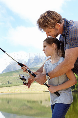 Buy stock photo Father, kid and fishing in nature for learning, teaching and outdoor with holiday, travel or sustainable living. Happy family, dad or fisherman with girl or child by river, water or lake for camping