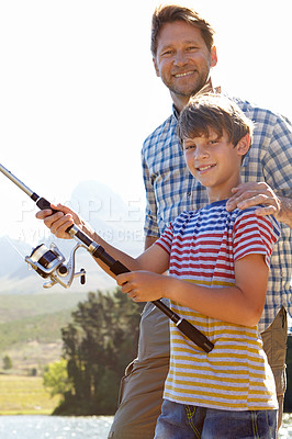 Buy stock photo Fishing, portrait or father and son in nature for travel, bonding and vacation, holiday or trip. Fish, line or kid with dad outdoor with love, learning or sustainable living while camping in a forest