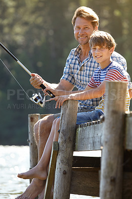 Buy stock photo Lake, fishing or pole by father and son portrait in nature bonding, vacation or travel adventure. Fishing, love and kid with dad at river for learning, teaching or sustainable living while camping