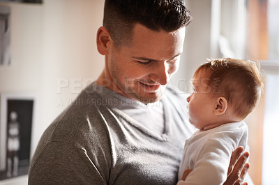 Buy stock photo Father, baby and home with love, youth and support together with family care and development. Dad, smile and young child in a house with parent bonding with newborn and happy about infant growth 