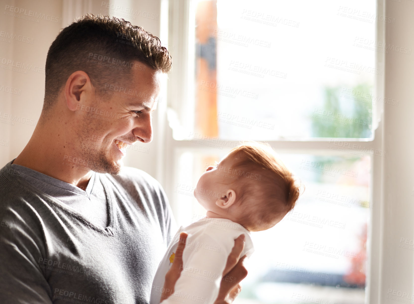 Buy stock photo Father, baby and home with care, love and support together with family bonding, playing and development. Dad, smile and young child in a house with kid and parent happy about infant growth at window