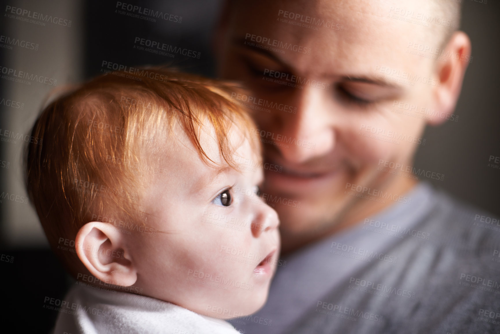 Buy stock photo Closeup of dad, baby and pride with hug for bonding, love and happy with child development and parenting. Peace, calm and childhood with smile, man and newborn kid for tender moment at family home