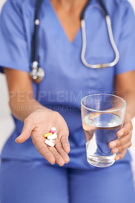 Buy stock photo Nurse, hands and giving medicine with glass of water for healthcare, wellness and pharmaceutical support. Medical worker or caregiver offer in palm of pills, tablet and liquid to drink for helping
