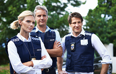 Buy stock photo Security, law enforcement and team of police officers outdoors for crime, protection and safety service. Guard, collaboration and me and women with crossed arms for patrol, justice and surveillance