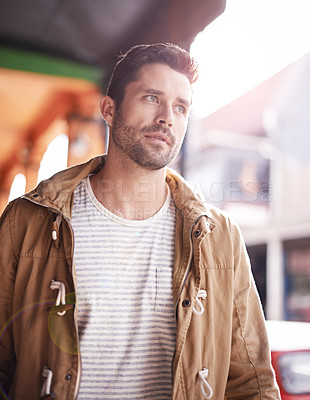 Buy stock photo Man, face and serious in city with fashion outdoor with urban style, trendy outfit and confidence. Male person, walking and commute in Cape Town with wellness, casual clothes and morning travel