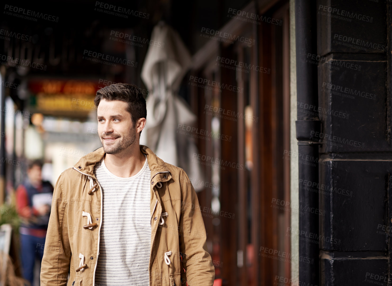 Buy stock photo Man, face and happiness in city with fashion by restaurant with urban style, trendy outfit and confidence. Male person, smile and relax outdoor in town with walking, casual clothes and morning trip